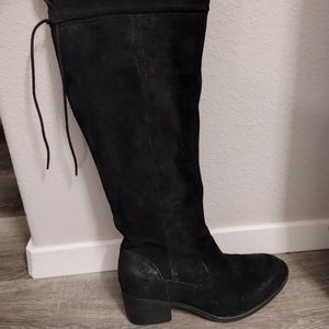 Born over the knee black leather boots